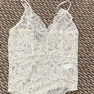 White Crochet body suit never worn